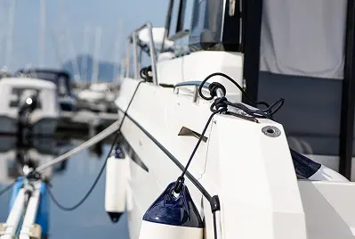 Boat fenders hanging from a boat